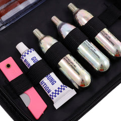Kit de réparation pour pneus tubeless crevés avec cartouches de CO2