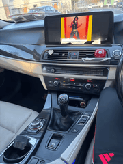 BMW Série 5 GT F07 09-17 - Autoradio 12,3" avec Apple CarPlay et Android Auto installé dans l’habitacle du véhicule.