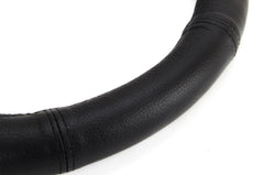 Détail du couvre-volant en cuir naturel